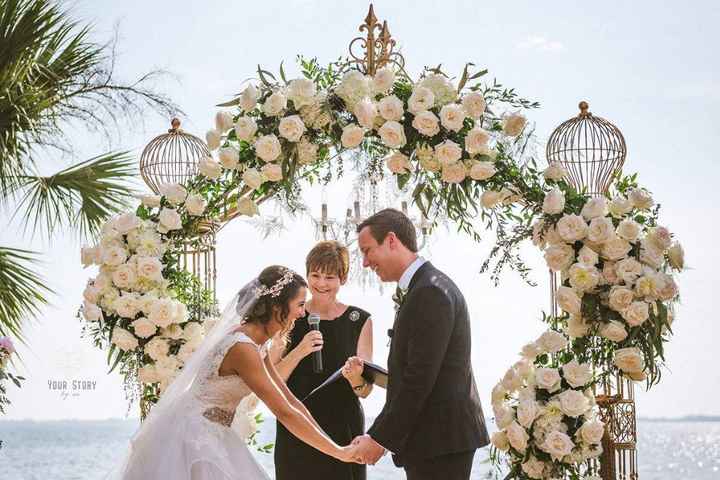 Ornate floral arch with white flowers