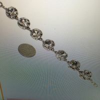 What color jewelry with a Platinum sequin BM dress? pictures =)