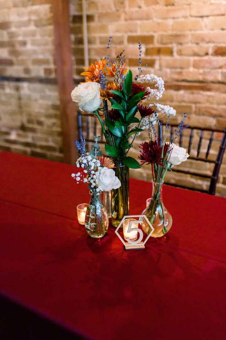 How to use table numbers without ruining centerpieces - 1