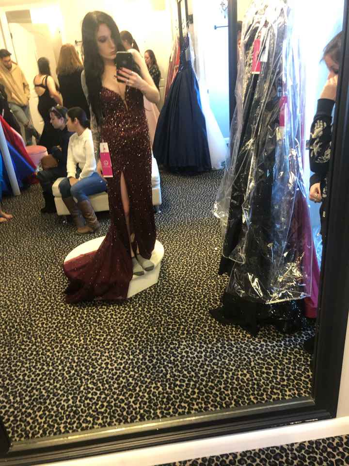 Who is wearing a 2nd dress? - 2
