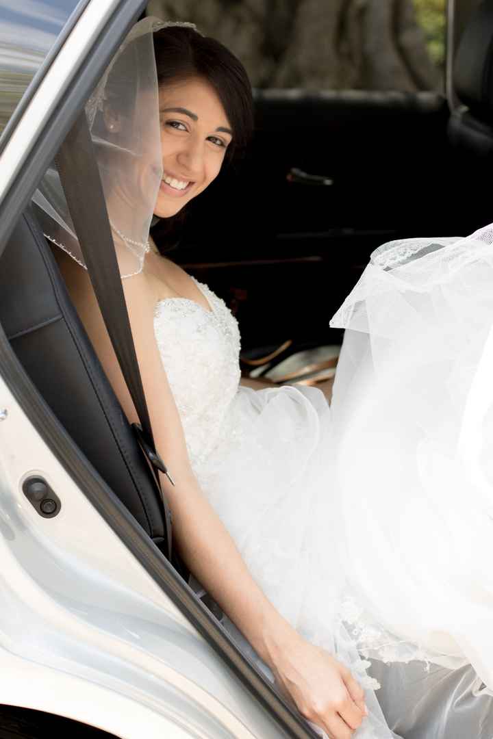 Getting in the car with your wedding dress on