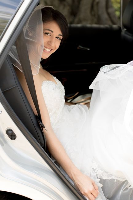 Getting in the car with your wedding dress on