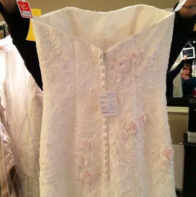 How much did you spend on your wedding dress??