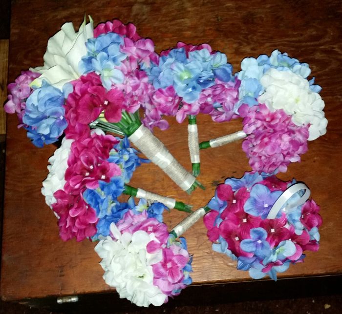 Mason jar drinking glasses and bouquets