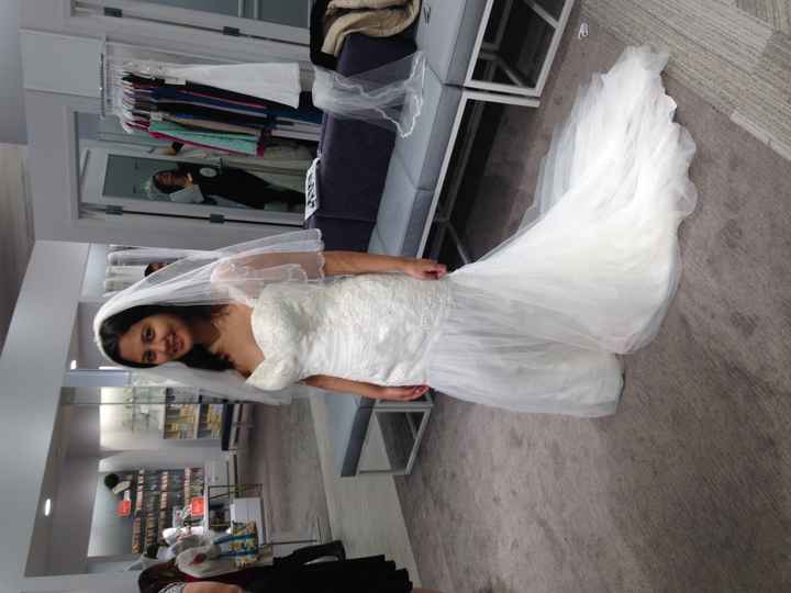 The wedding dresses I have tried (with pics)
