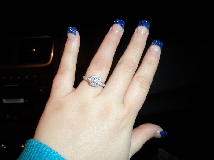 yay!!! my ring is back (art-sy pic) show me yours
