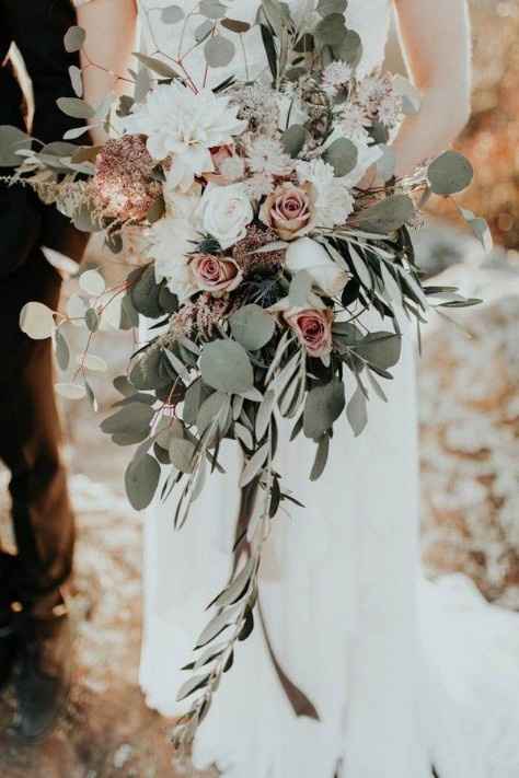 My bouquet and the flowers in the centerpieces will look more like these. 