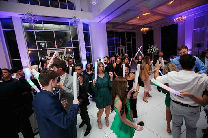 Guests with Glow Sticks on Dance Floor