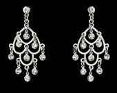 Torn between 2 pairs of earrings; which pair do you think looks best with my dress?