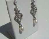 Torn between 2 pairs of earrings; which pair do you think looks best with my dress?