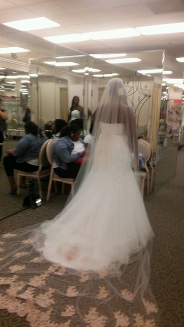 Who is your wedding dress designer? 3