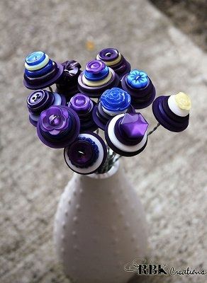 Got more pics of my centerpieces/bouquets/bouts/corsages :) :)
