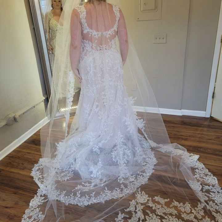 Wedding hair for a dress with a detailed back? - 3