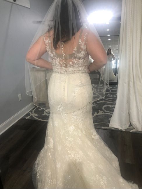 Wedding hair for a dress with a detailed back? 1