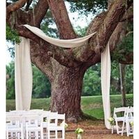 Can I see pics of your aisle/ceremony decor and wedding arbors?
