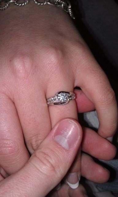 yay!!! my ring is back (art-sy pic) show me yours