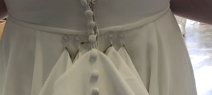 My wedding dress had buttons just like this and a button hook tool