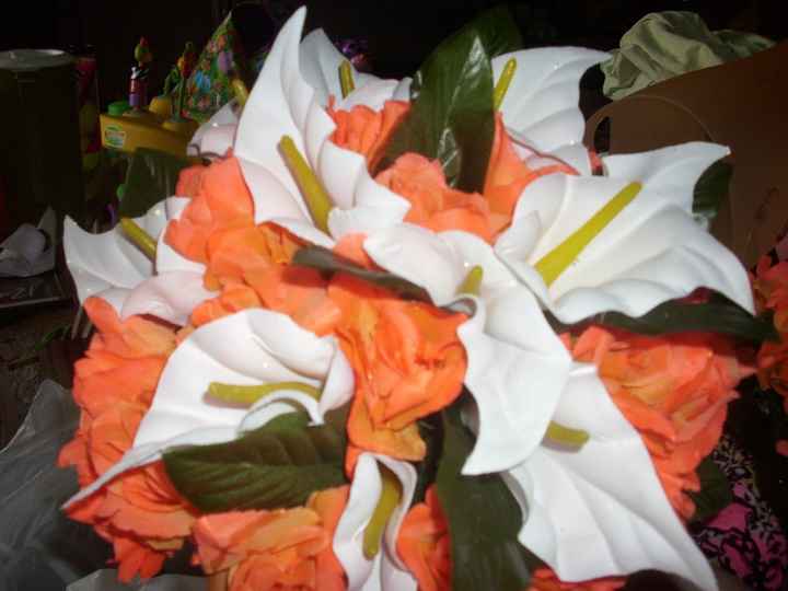 Help need ideas for bridemaids bouquet, peacock theme, cant afford flowers.