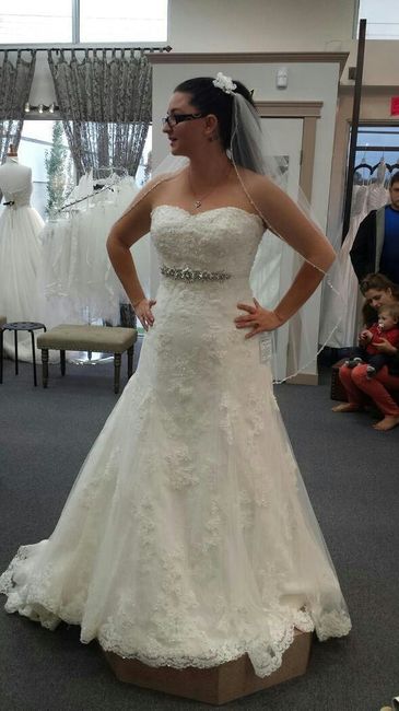 Brides with form fitting dresses