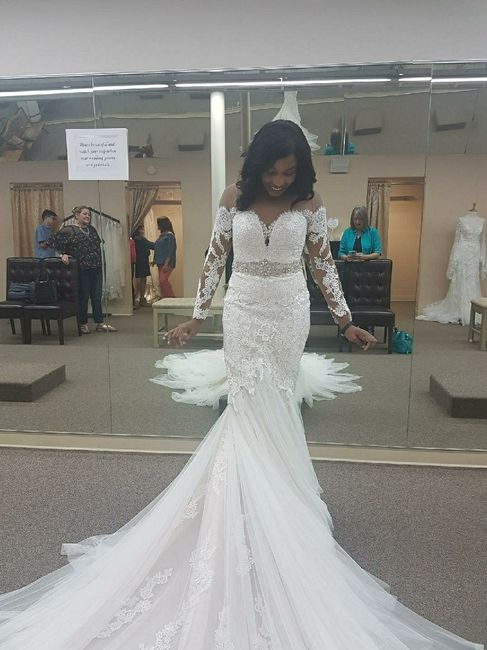 How much was your wedding dress? 4