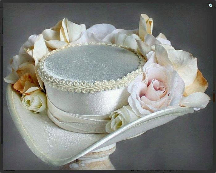 Custom made mini tricorn hat. Adding a birdcage veil.