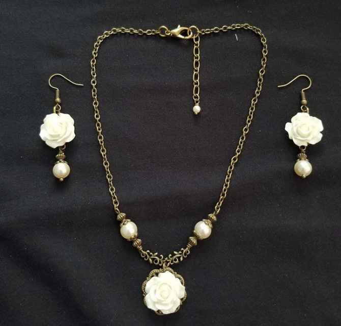 Custom made ivory pearl and antique brass jewelry set.