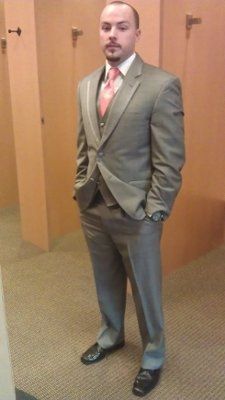 What is the groom wearing? *Update*