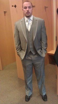 What is the groom wearing? *Update*