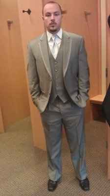 What is the groom wearing? *Update*