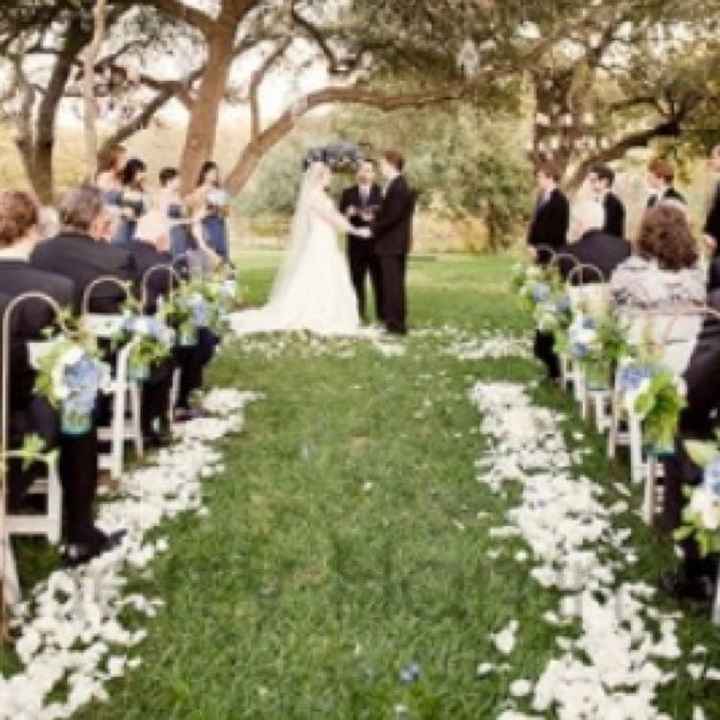 Can I see pics of your aisle/ceremony decor and wedding arbors?