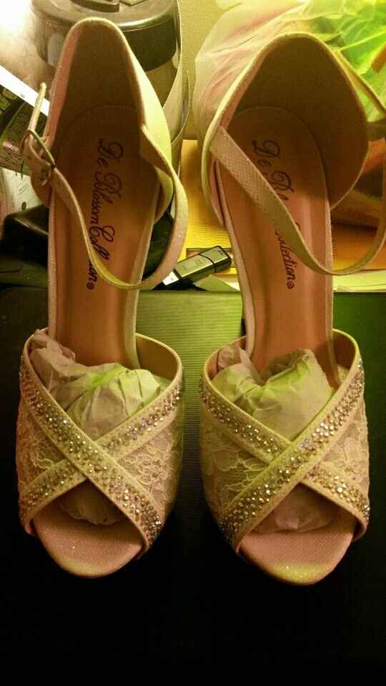 I got my wedding shoes in the mail yesterday!! :)