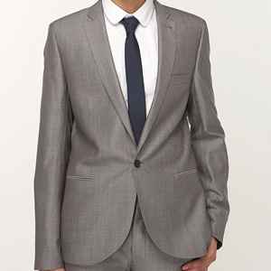 Suits vs. Tuxes
