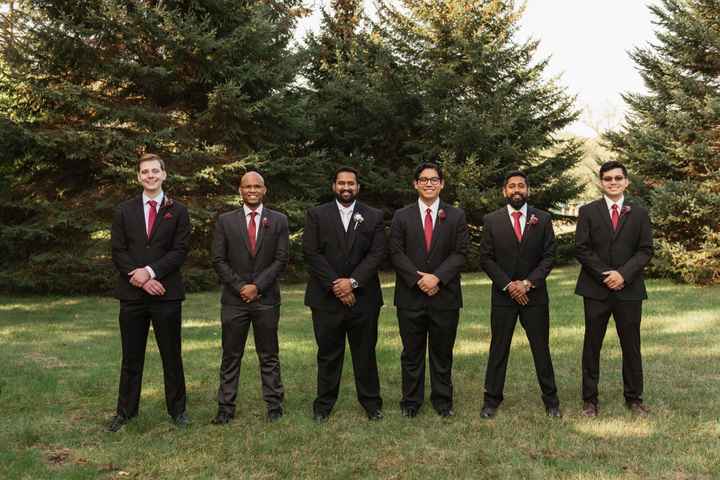 Did the groomsmens’ suits all match? - 1