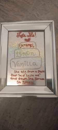 Our cake flavour sign with an alice in wonderland quote