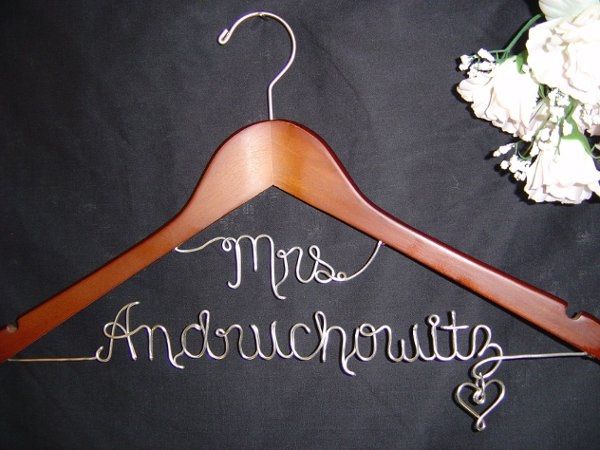 This lady does nice work. personalized wedding hangers
