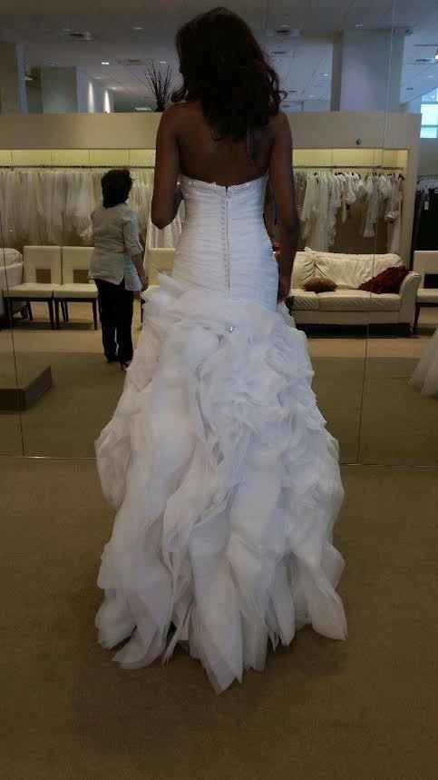 It's a rainy day here on the East Coast, I'm in need of sunshine.  So show me your wedding dress