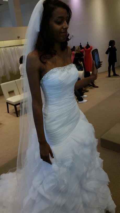 It's a rainy day here on the East Coast, I'm in need of sunshine.  So show me your wedding dress