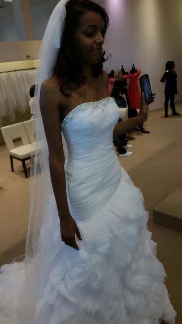 It's a rainy day here on the East Coast, I'm in need of sunshine.  So show me your wedding dress