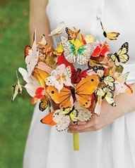 ANY IDEAS $ A BUTTERFLY THEMED WEDDING!!! HELP!!