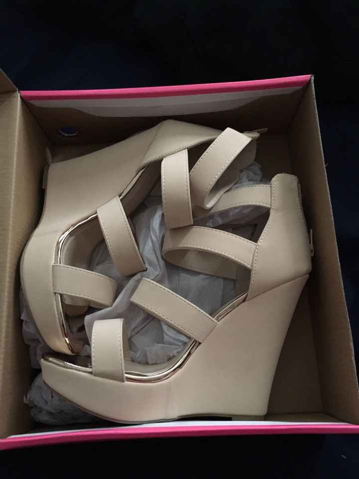 We got my wedding shoes!