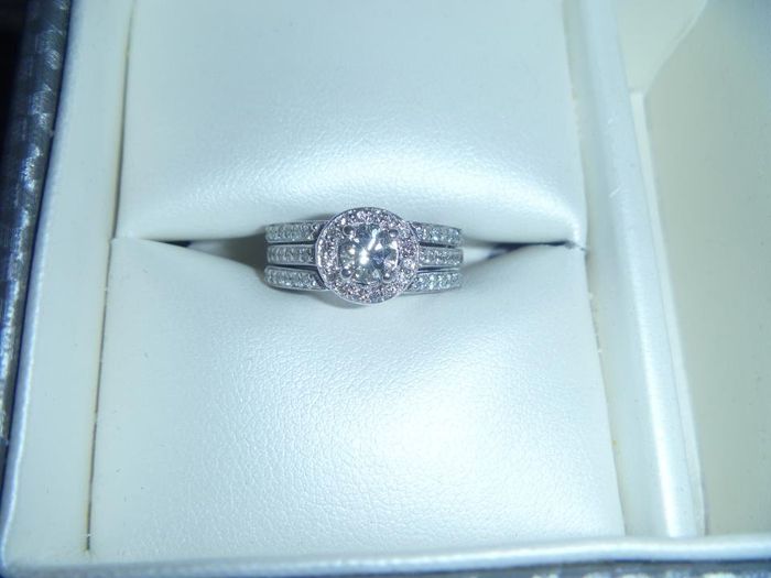 We haven't seen any BLING in a while!  Show off your rings!