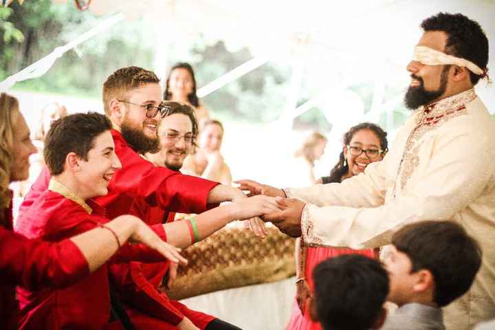 Trying to pick out my hand... from a lineup of groomsmen