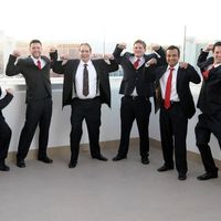 Is it OK for groomsmen to wear a mix of tux and suits or will it look too messy?