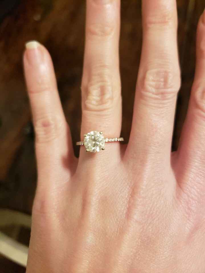 Who has a rose gold ring? - 1