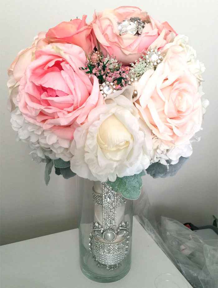 added more flowers and little round pieces of bling