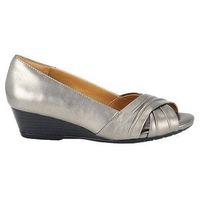 Who is wearing wedges?