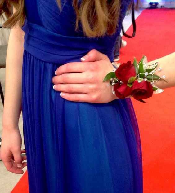 Blue dress with red corsage