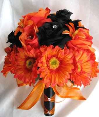 what flowers for black bridesmaids dresses with orange shawls?