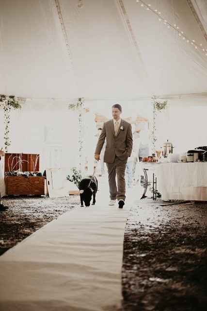 Groom entering with pup