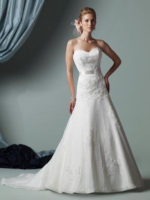 Whose your dress designer?